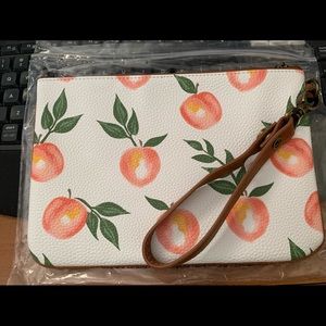 Brand new 31 Rubie mini with wristlet strap.
